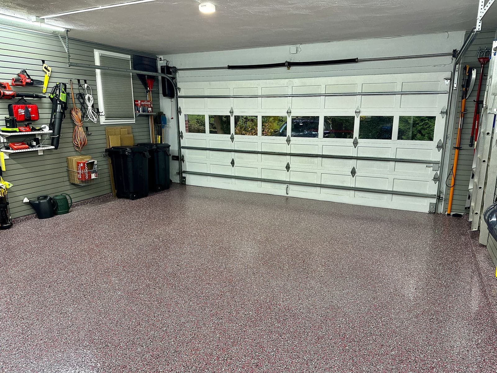 View from the back wall with the garage door closed. Completely organized and clean