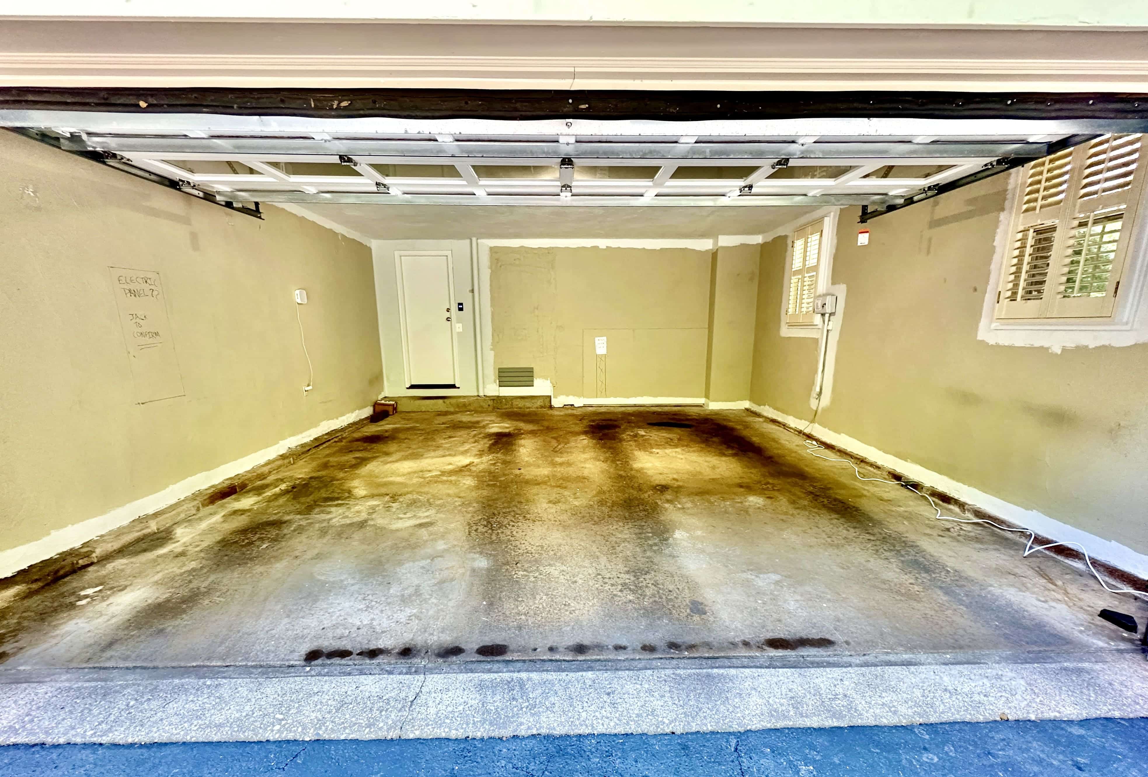 Garage completely emptied and ready for the transformation. Walls painted in advance