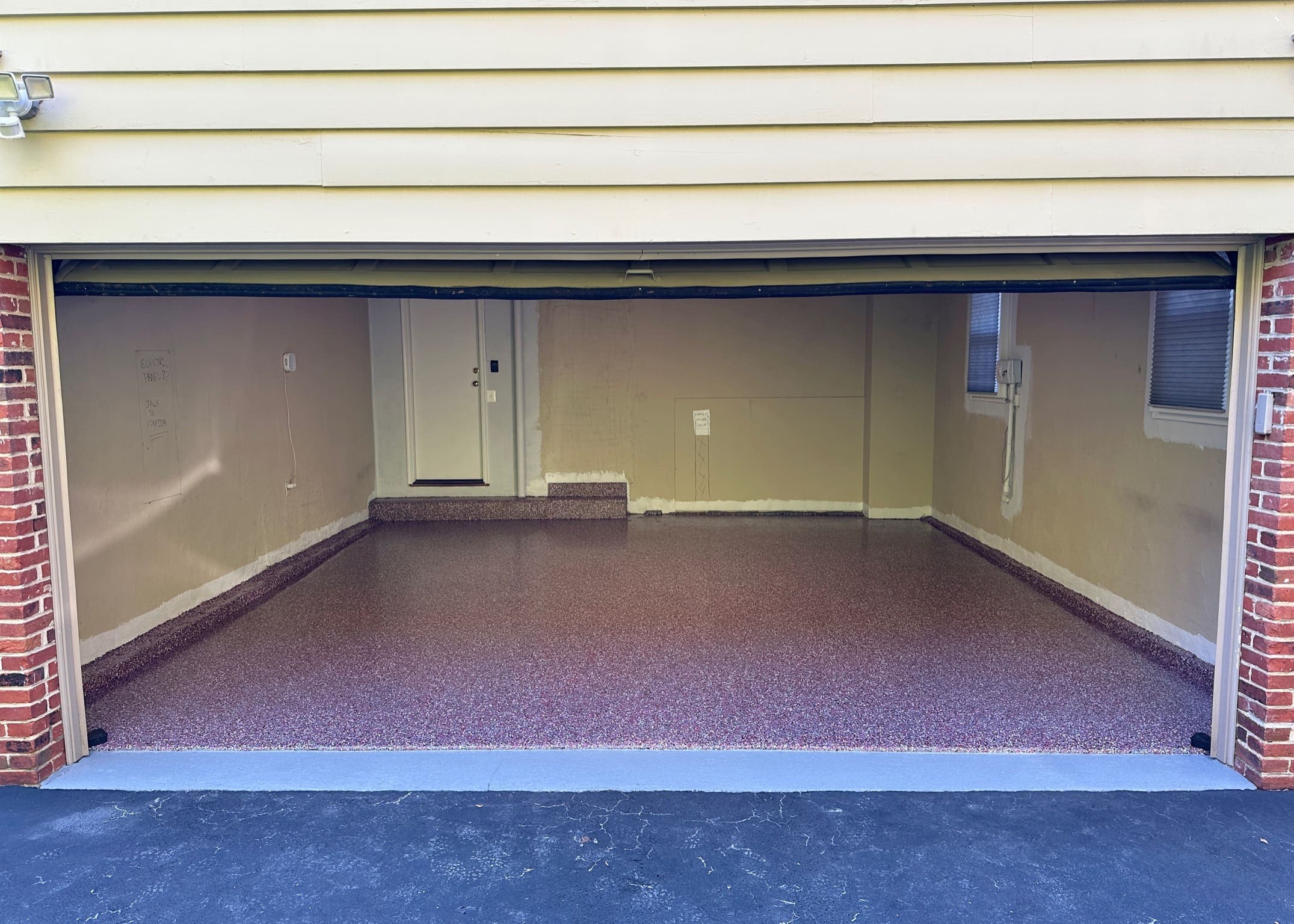 Red, grey, and black epoxy floor completed